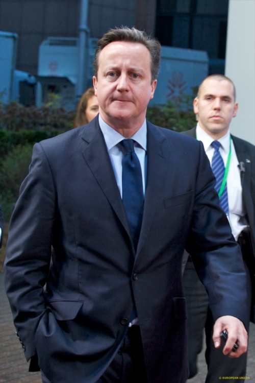 The British Premier looks pissed off at the camera, probably because of the criticism that his immigration proposed reform would meet at the Council last week, 18-19 December. Mr David Cameron is the UK Prime Minister and the leader of the British Conservative Pary. (European Council Audiovisual Services, 18/12/2014)