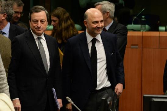 Eurogroup meeting of 20/02/2015. Mario Draghi, President of the European Central Bank (ECB), and Pierre Moscovici Member of the EC in charge of Economic and Financial Affairs, Taxation and Customs (in the foreground, from left to right), participated in that crucial meeting with the 19 of Eurozone Ministers for Finance. They all agreed to consider extending financial assistance to Greece, which was formally known as the Master Financial Assistance Facility Agreement, granted by the European Financial Stability Facility (EFSF). Discussions took place in the context of the expiry of the financial assistance to Greece due on 28/02/2015. (EC Audiovisual Services).